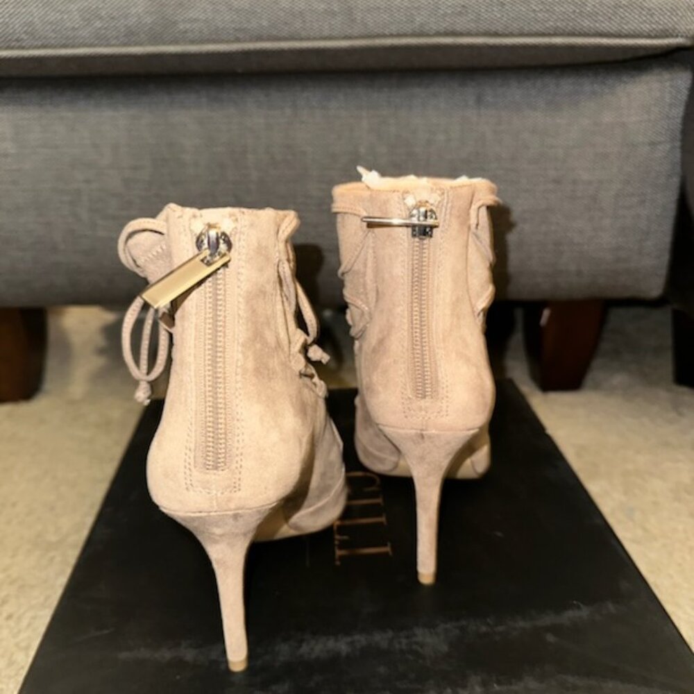 Peep toe suede heels